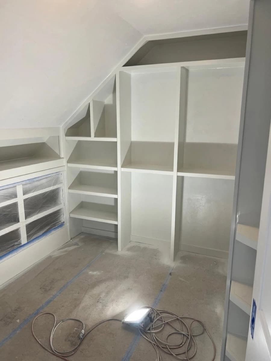 Drywall repair and carpentry work in progress inside a North Shore home
